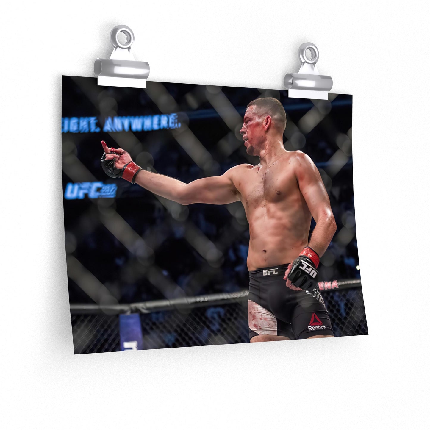 Nate Diaz Flips Off His Opponent In The Cage Poster